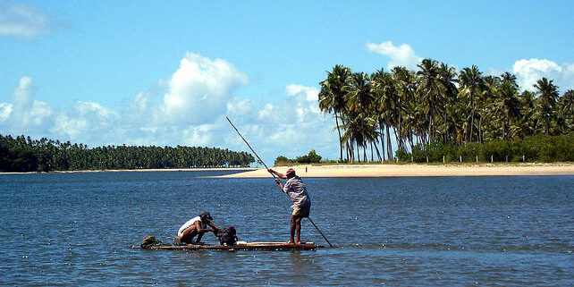 Fishermen at freshwater stream near Tamandare, PE, Brazil